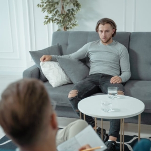 Mental health coach teaching mindset and emotional resilience techniques