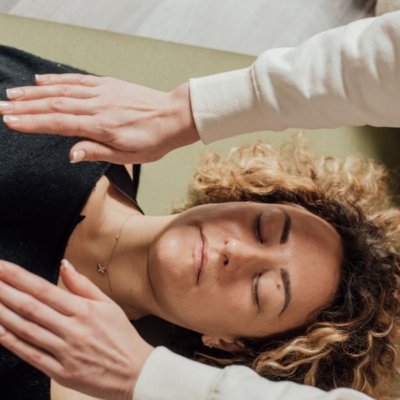 Practitioner and client during an energy healing session, representing how energy healing works