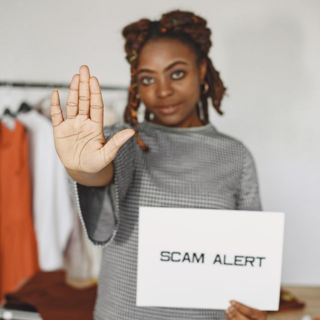 Consumer researching psychic scams and spiritual healer fraud statistics